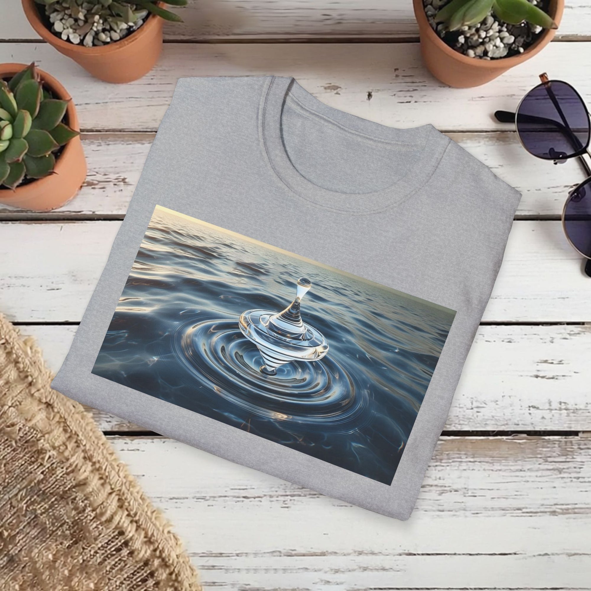 Glass Balance T-Shirt – Surreal Spinning Top Over Water | Reflective Zen Aesthetic Tee