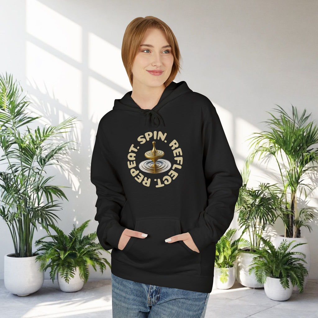 SPIN. REFLECT. REPEAT. Hoodie – Mindful Motivation Streetwear | Gold Spinning Top Design