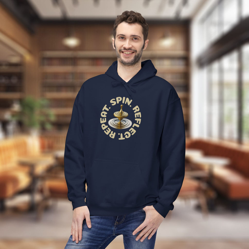 SPIN. REFLECT. REPEAT. Hoodie – Mindful Motivation Streetwear | Gold Spinning Top Design