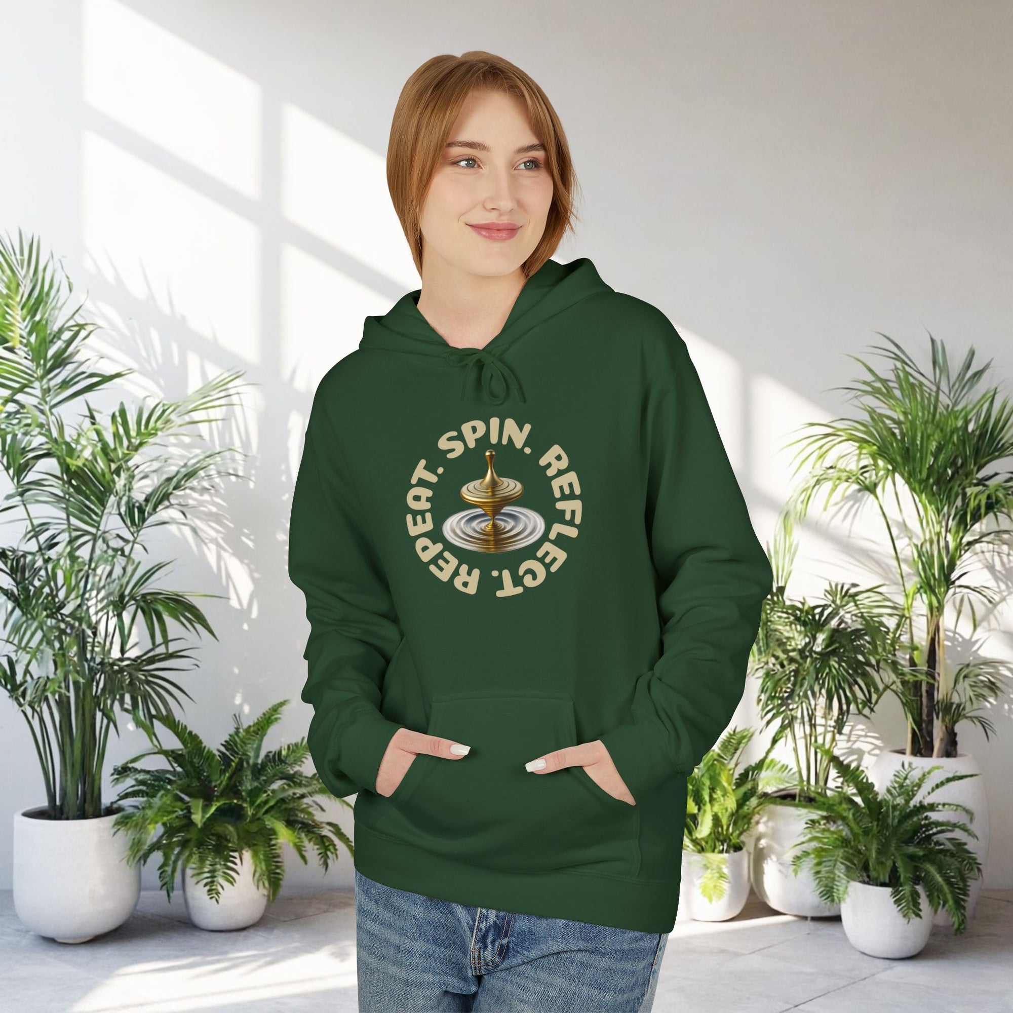 SPIN. REFLECT. REPEAT. Hoodie – Mindful Motivation Streetwear | Gold Spinning Top Design