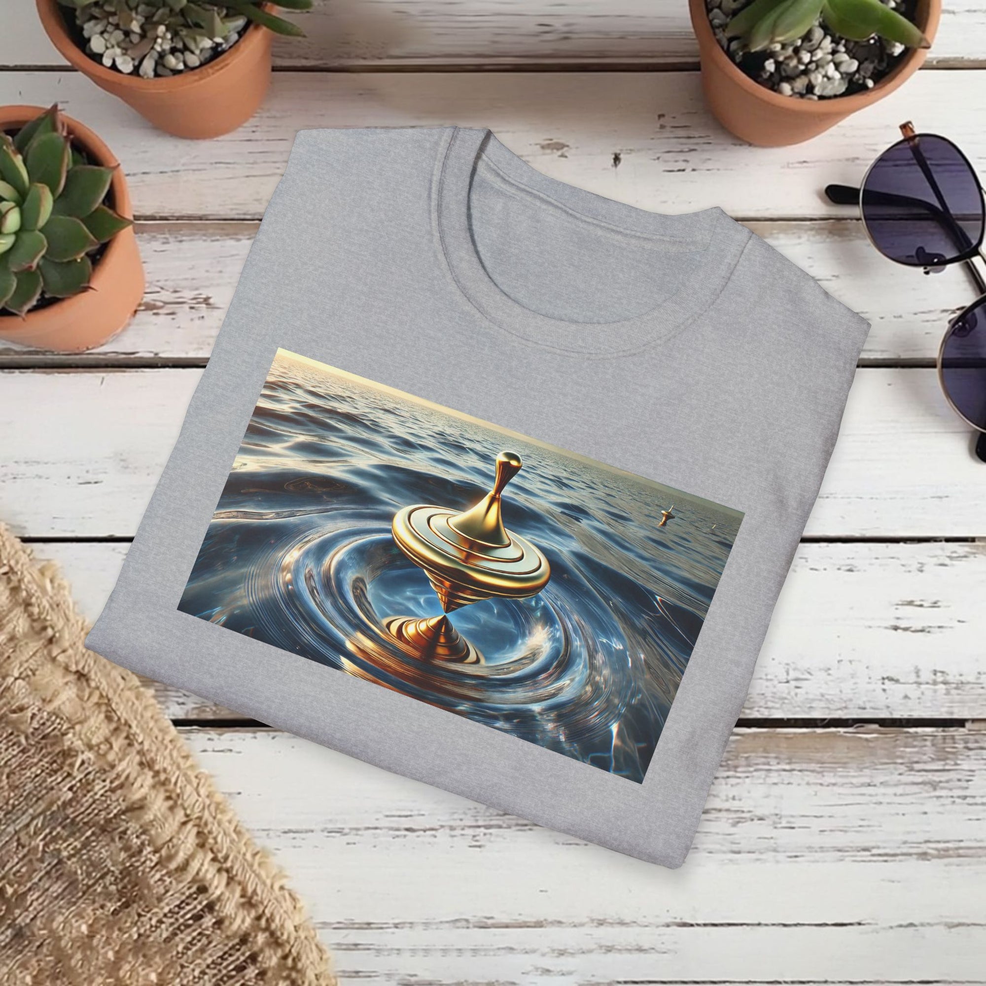 Golden Balance T-Shirt – Surreal Spinning Top Over Water | Reflective Zen Aesthetic Tee