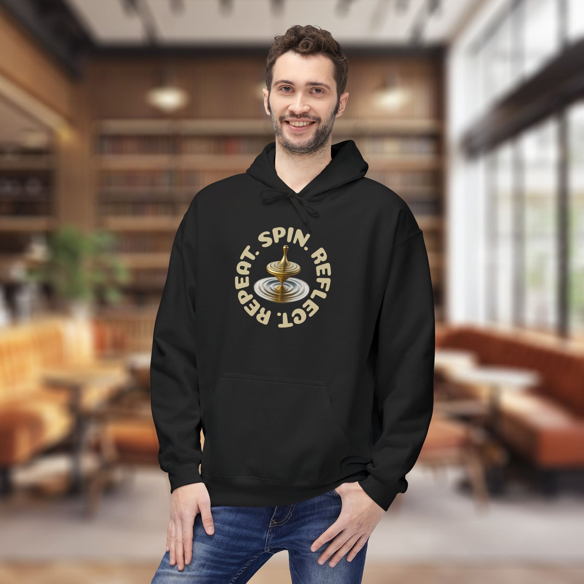 SPIN. REFLECT. REPEAT. Hoodie – Mindful Motivation Streetwear | Gold Spinning Top Design